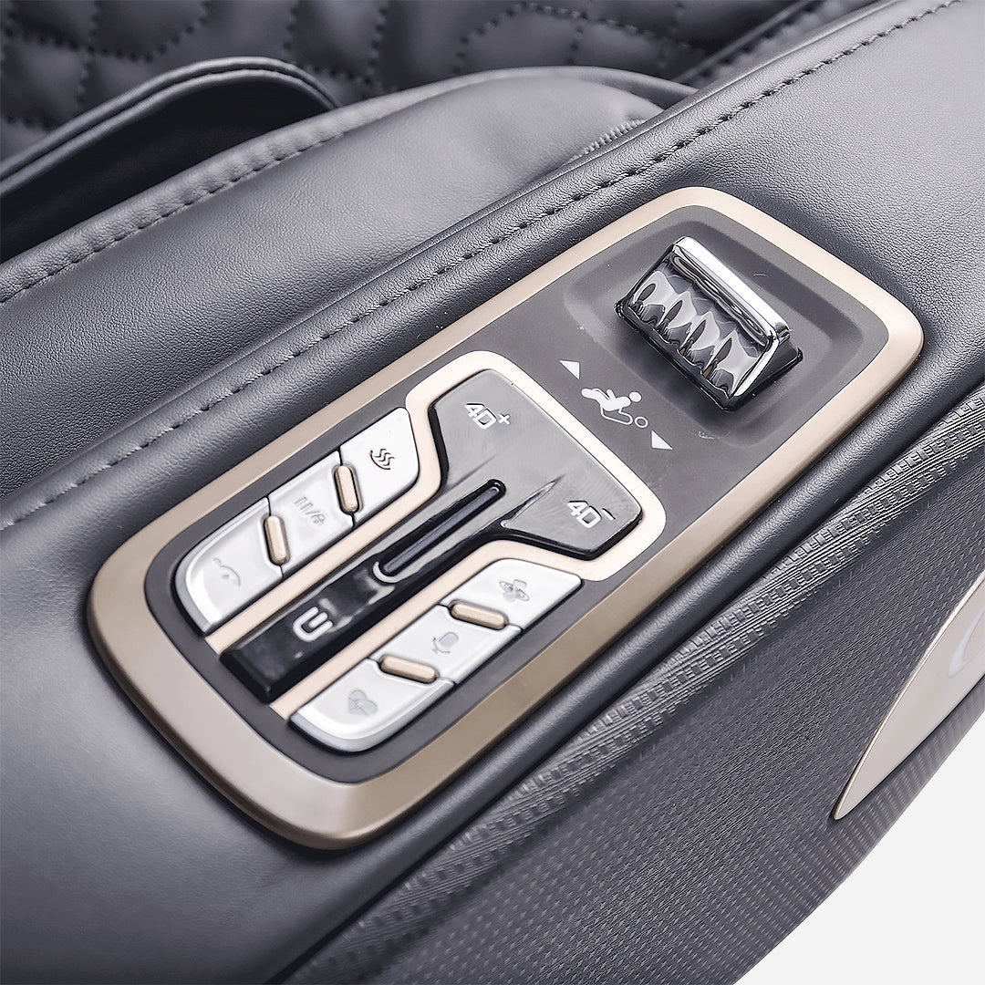 Close-up of Meister Massage Chair seat control panel with various buttons and a brand logo.